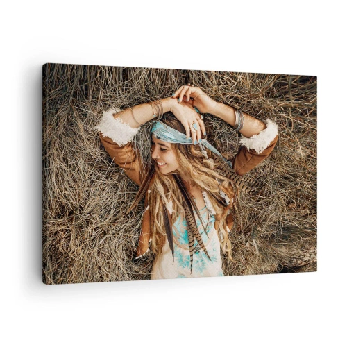 Obraz na plátne - Žena v boho štýle ležiaca na sene - 70x50cm - Na ceste do leta lásky - Moderná nástenná dekorácia do obývacej izby a spálne ARTTOR
