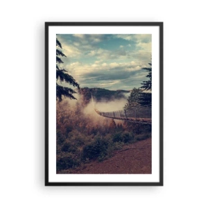 Plagát v čiernom ráme - Visutý most medzi hmlistými horami pri západe slnka - 50x70cm - Nad jesenným lesom - Moderná nástenná dekorácia do obývacej izby a spálne ARTTOR