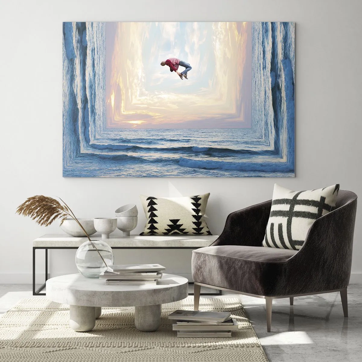 Obraz na skle - Muž skákajúci cez more v surrealistickom zábere - 70x50cm - Do inej dimenzie - Moderná nástenná dekorácia do obývacej izby a spálne ARTTOR