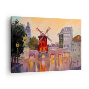 Obraz na plátne - Červený veterný mlyn Moulin Rouge obklopený panorámou mesta - 70x50cm - Parížske ikony – Moulin Rouge - Moderná nástenná dekorácia do obývacej izby a spálne ARTTOR