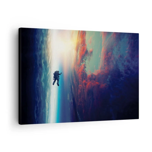 Obraz na plátne - Astronaut vznášajúci sa vo vesmíre nad farebnou Zemou - 70x50cm - Tvárou v tvár vesmíru - Moderná nástenná dekorácia do obývacej izby a spálne ARTTOR