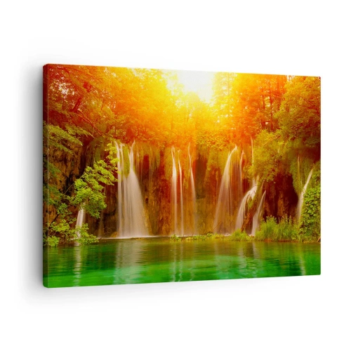 Obraz na plátne - Vodopády obklopené zeleňou v žiari zapadajúceho slnka - 70x50cm - Na slnku a v tieni - Moderná nástenná dekorácia do obývacej izby a spálne ARTTOR