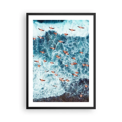 Plagát v čiernom ráme - Plameniaky nad oceánskymi vlnami v intenzívnych farbách - 50x70cm - Prímorský sprievod - Moderná nástenná dekorácia do obývacej izby a spálne ARTTOR
