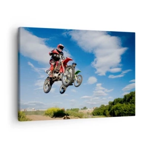 Obraz na plátne - Jazdci na motokrosových motorkách vo vzduchu počas skoku - 70x50cm - Skok z oblakov - Moderná nástenná dekorácia do obývacej izby a spálne ARTTOR