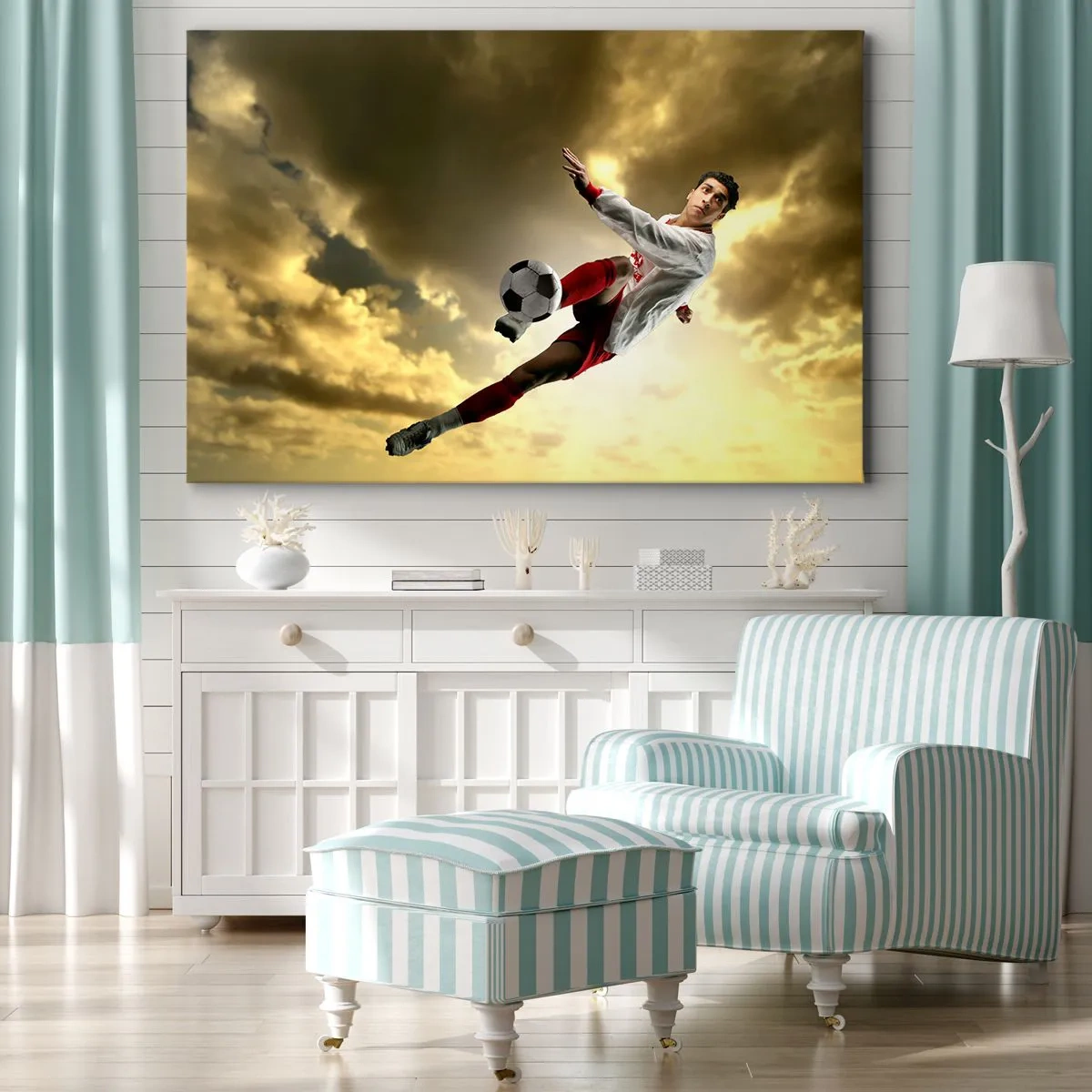 Obraz na plátne - Futbalista v dynamickom výskoku kope loptu proti oblohe - 70x50cm - Futbalové nebo - Moderná nástenná dekorácia do obývacej izby a spálne ARTTOR