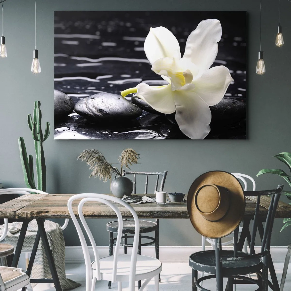 Obraz na plátne - Biela orchidea na pozadí čiernych kameňov a vody. - 70x50cm - Štúdia v čiernej a bielej - Moderná nástenná dekorácia do obývacej izby a spálne ARTTOR