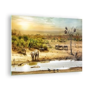 Obraz na skle - Slony a zvieratá pri napájadle na pozadí africkej krajiny - 70x50cm - „Z raja opäť pramenila rieka…“ - Moderná nástenná dekorácia do obývacej izby a spálne ARTTOR
