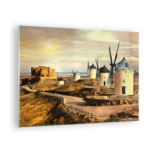 Obraz na skle - Veterné mlyny a hrad v krajine pri západe slnka - 70x50cm - Čoskoro sa objaví Don Quijote - Moderná nástenná dekorácia do obývacej izby a spálne ARTTOR