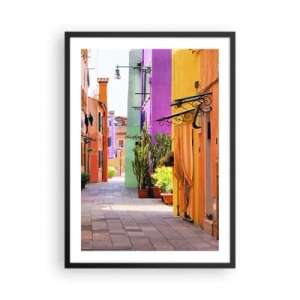 Plagát v čiernom ráme - Farebná ulica s rastlinami a žiarivými fasádami budov - 50x70cm - Dúhová ulička - Moderná nástenná dekorácia do obývacej izby a spálne ARTTOR