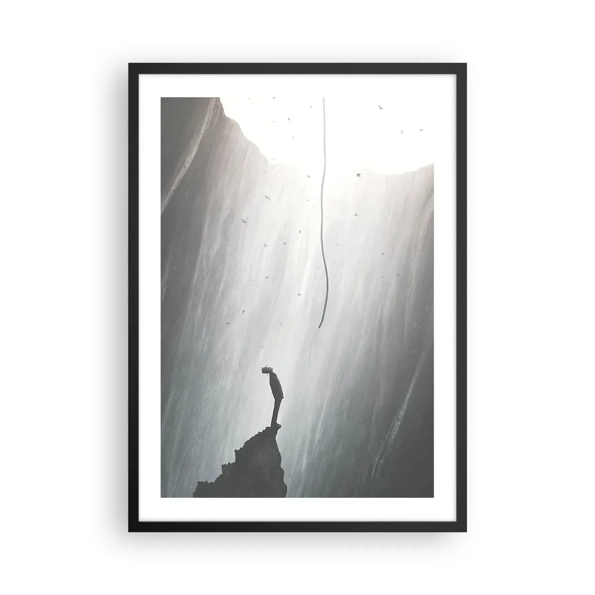 Plagát v čiernom ráme - Postava na okraji útesu vo svetle priepasti - 50x70cm - Vždy máte na výber - Moderná nástenná dekorácia do obývacej izby a spálne ARTTOR