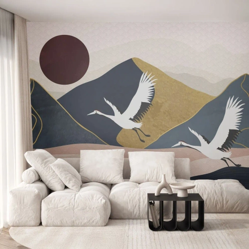 Fototapeta Standard Eco - Štylizované žeriavy na pozadí hôr a červeného slnka - 100x70cm - Opäť ubehol ďalší deň - Moderná nástenná dekorácia do obývacej izby a spálne ARTTOR