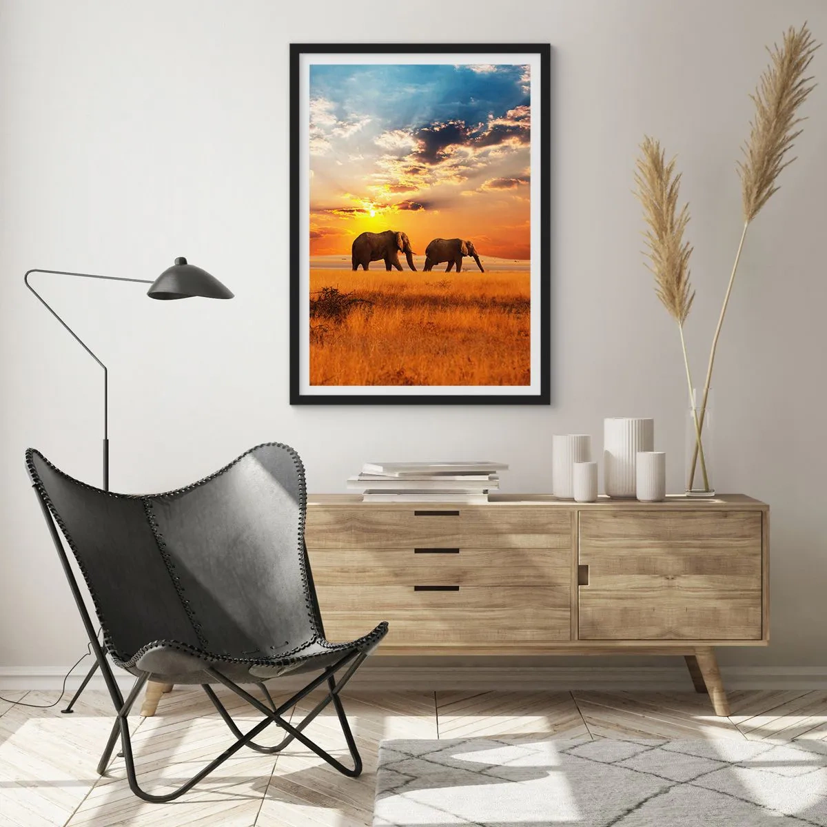 Plagát v čiernom ráme - Slony kráčajú v žiari zapadajúceho slnka - 50x70cm - Rodinná prechádzka - Moderná nástenná dekorácia do obývacej izby a spálne ARTTOR