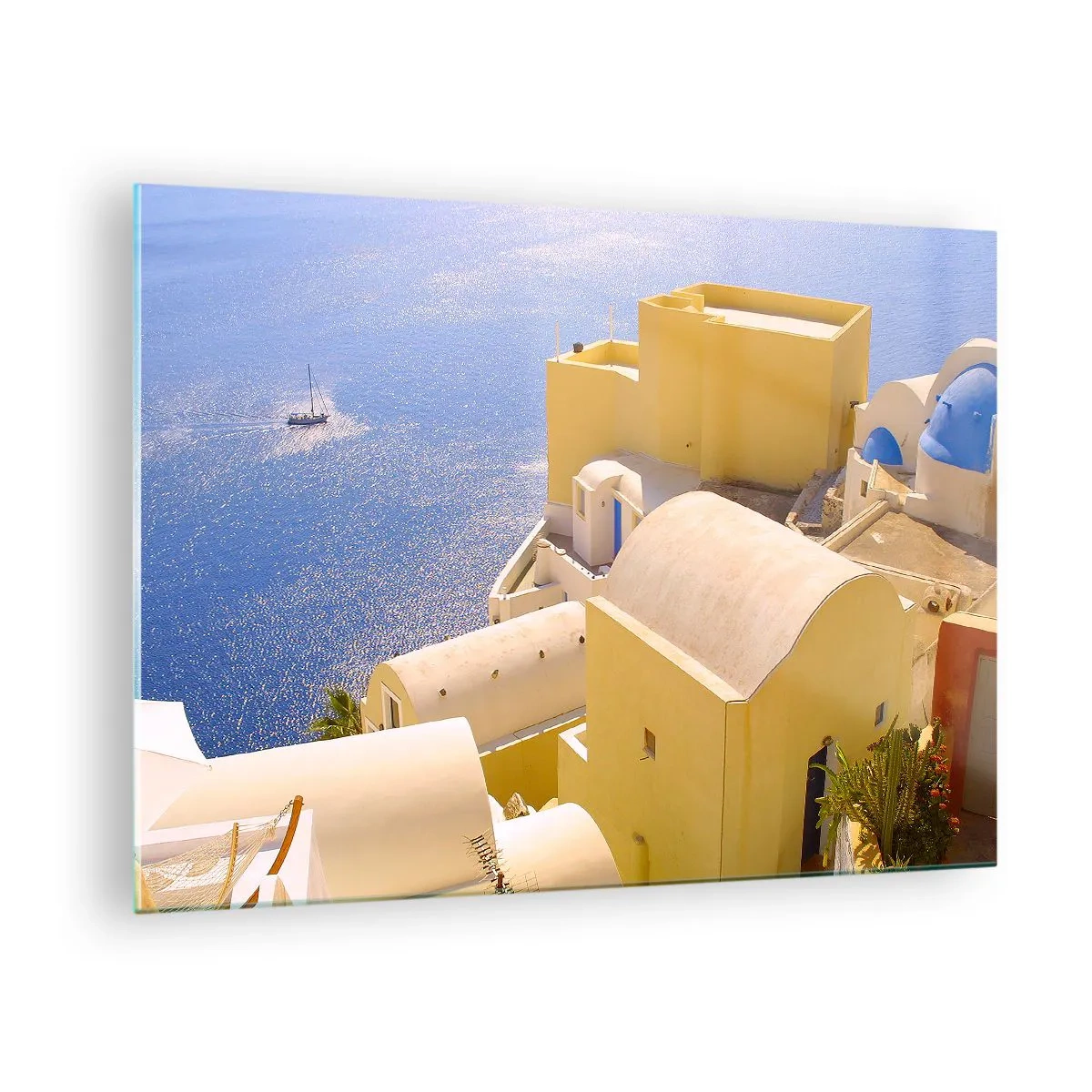 Obraz na skle - Pohľad na Santorini s modrým morom a bielymi budovami - 70x50cm - Grécka krajina v bielej a blankytnej - Moderná nástenná dekorácia do obývacej izby a spálne ARTTOR