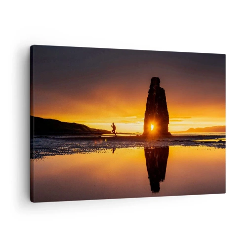 Obraz na plátne - Osoba bežiaca na pláži pri západe slnka so skalným útvarom - 70x50cm - Iba ty a príroda - Moderná nástenná dekorácia do obývacej izby a spálne ARTTOR
