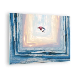 Obraz na skle - Muž skákajúci cez more v surrealistickom zábere - 70x50cm - Do inej dimenzie - Moderná nástenná dekorácia do obývacej izby a spálne ARTTOR