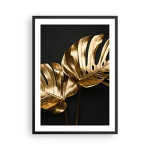 Plagát v čiernom ráme - Zlaté listy monstery na čiernom pozadí, elegantný farebný kontrast - 50x70cm - Poklady prírody - Moderná nástenná dekorácia do obývacej izby a spálne ARTTOR