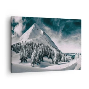 Obraz na plátne - Zasnežený vrchol hory obklopený zimným lesom - 70x50cm - Krajina snehu a ľadu - Moderná nástenná dekorácia do obývacej izby a spálne ARTTOR