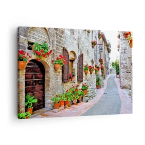 Obraz na plátne - Úzka ulica s kamennými budovami zdobenými kvetináčmi - 70x50cm - Talianska atmosféra - Moderná nástenná dekorácia do obývacej izby a spálne ARTTOR