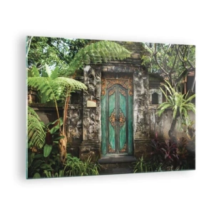 Obraz na skle - Zdobené tyrkysové dvere v kamennej stene obklopenej tropickou vegetáciou - 70x50cm - Dvere do exotického sveta - Moderná nástenná dekorácia do obývacej izby a spálne ARTTOR