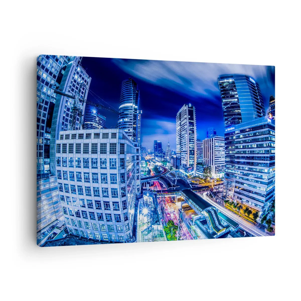 Obraz na plátne - Panoráma nočného mesta s mrakodrapmi a pouličnými svetlami - 70x50cm - Rytmy nočného mesta - Moderná nástenná dekorácia do obývacej izby a spálne ARTTOR
