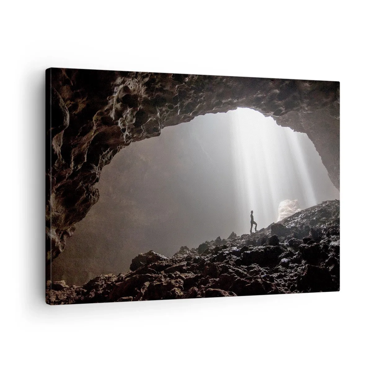 Obraz na plátne - Postava v jaskyni osvetlenej lúčmi svetla - 70x50cm - Svetelná jaskyňa - Moderná nástenná dekorácia do obývacej izby a spálne ARTTOR