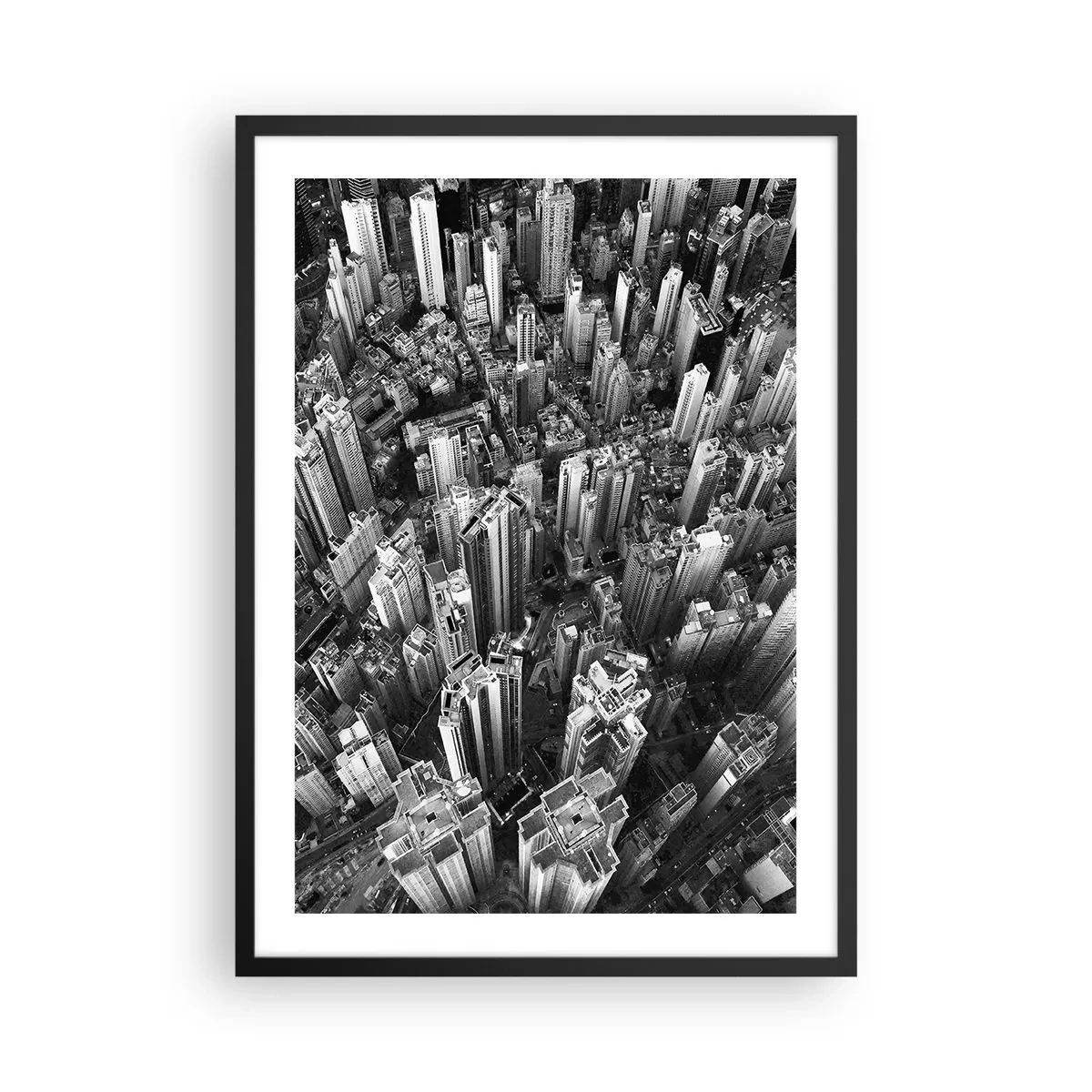 Plagát v čiernom ráme - Letecký pohľad na mestské mrakodrapy v čiernobielej farbe - 50x70cm - Stále vyššie a vyššie - Moderná nástenná dekorácia do obývacej izby a spálne ARTTOR