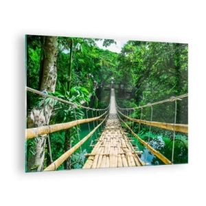 Obraz na skle - Visutý bambusový most uprostred tropickej zelene ponad rieku - 70x50cm - Opičí most nad zeleňou - Moderná nástenná dekorácia do obývacej izby a spálne ARTTOR