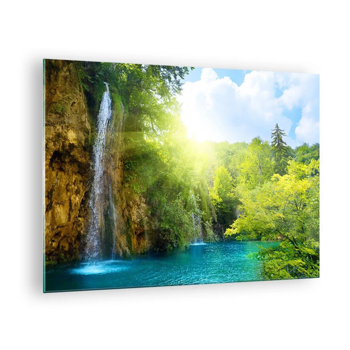 Obraz na skle - Vodopád tečúci do modrého jazera obklopeného zeleňou - 70x50cm - To musí byť Eden - Moderná nástenná dekorácia do obývacej izby a spálne ARTTOR
