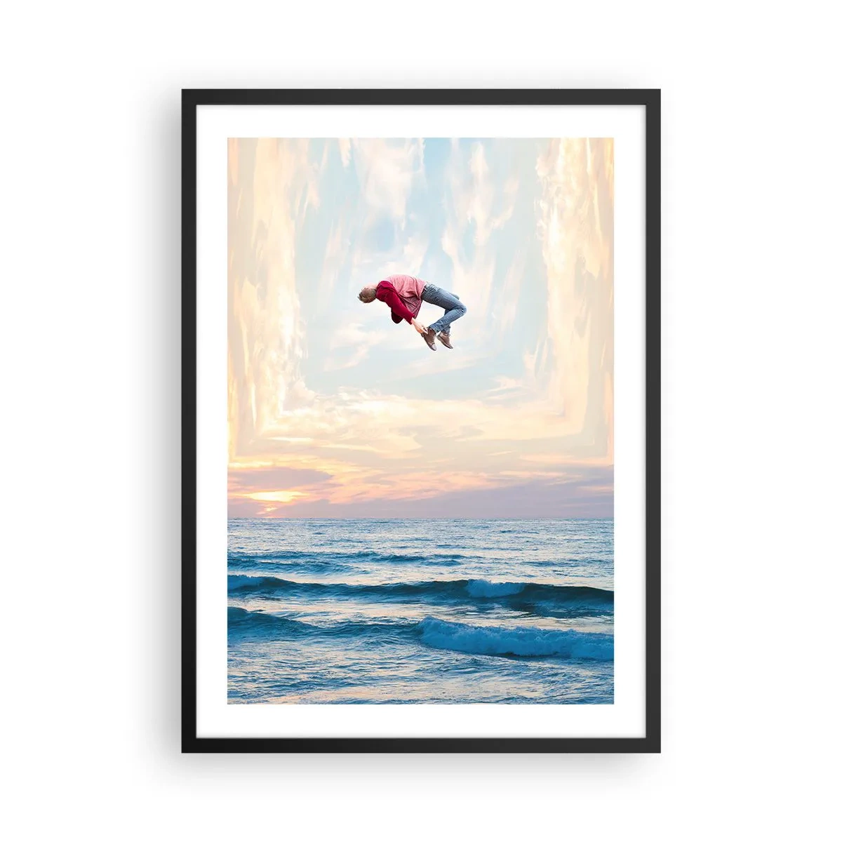 Plagát v čiernom ráme - Muž skáče do neba nad oceánom pri západe slnka - 50x70cm - Do inej dimenzie - Moderná nástenná dekorácia do obývacej izby a spálne ARTTOR