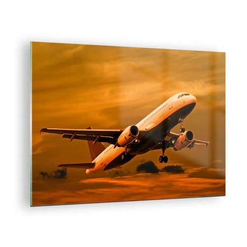 Obraz na skle - Lietadlo vzlietajúce proti oranžovej oblohe - 70x50cm - Let smerom k slnku - Moderná nástenná dekorácia do obývacej izby a spálne ARTTOR