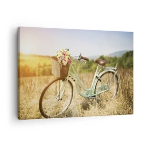 Obraz na plátne - Retro bicykel s košíkom plným kvetov na pozadí lúky. - 70x50cm - Chvíľu tu zostanem - Moderná nástenná dekorácia do obývacej izby a spálne ARTTOR
