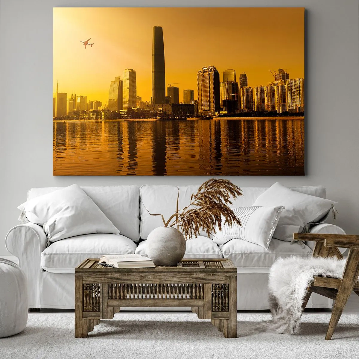 Obraz na plátne - Panoráma mesta pri západe slnka s mrakodrapmi a lietadlom - 70x50cm - Zlaté mesto - Moderná nástenná dekorácia do obývacej izby a spálne ARTTOR