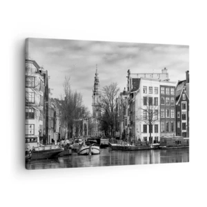 Obraz na plátne - Čiernobiela panoráma Amsterdamu s kanálom a historickými budovami - 70x50cm - Amsterdamské vibrácie - Moderná nástenná dekorácia do obývacej izby a spálne ARTTOR