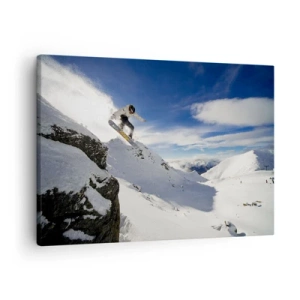 Obraz na plátne - Snowboardista skáče z útesu so zasneženými horami v pozadí. - 70x50cm - Sloboda bez hraníc - Moderná nástenná dekorácia do obývacej izby a spálne ARTTOR