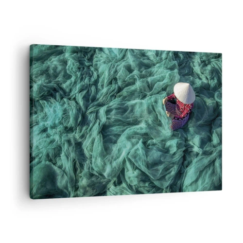 Obraz na plátne - Osoba s klobúkom medzi zelenými rybárskymi sieťami - 70x50cm - V mori sietí - Moderná nástenná dekorácia do obývacej izby a spálne ARTTOR