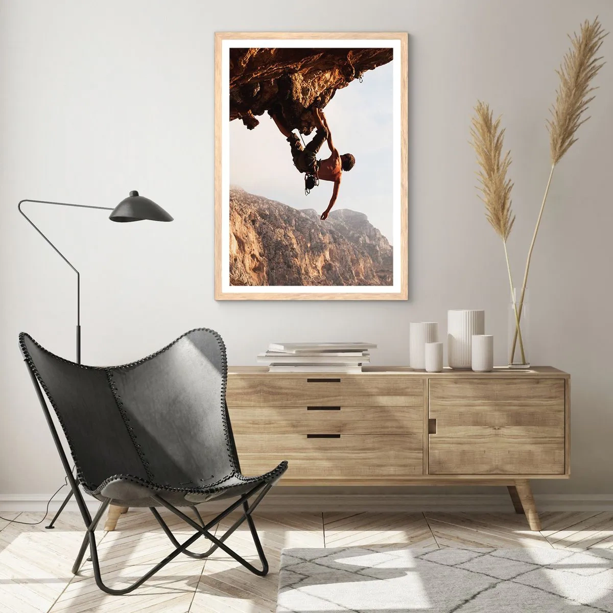 Plagát v ráme zo svetlého duba - Svet zovretý v ruke na zosuve balvanu - 70x100 cm